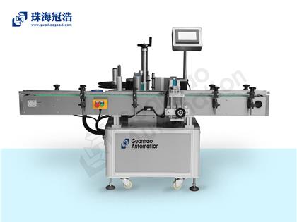 全自動圓瓶定位貼標(biāo)機